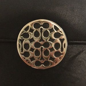 Black leather coach wallet.